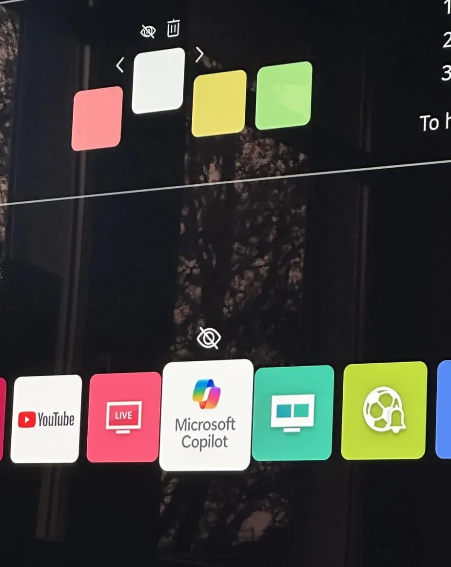 Smartphone home screen with YouTube, Live, and Microsoft Copilot app icons, suggesting platforms relevant for gaming video content Smartphone home screen with YouTube, Live, and Microsoft Copilot app icons, suggesting platforms relevant for gaming video content